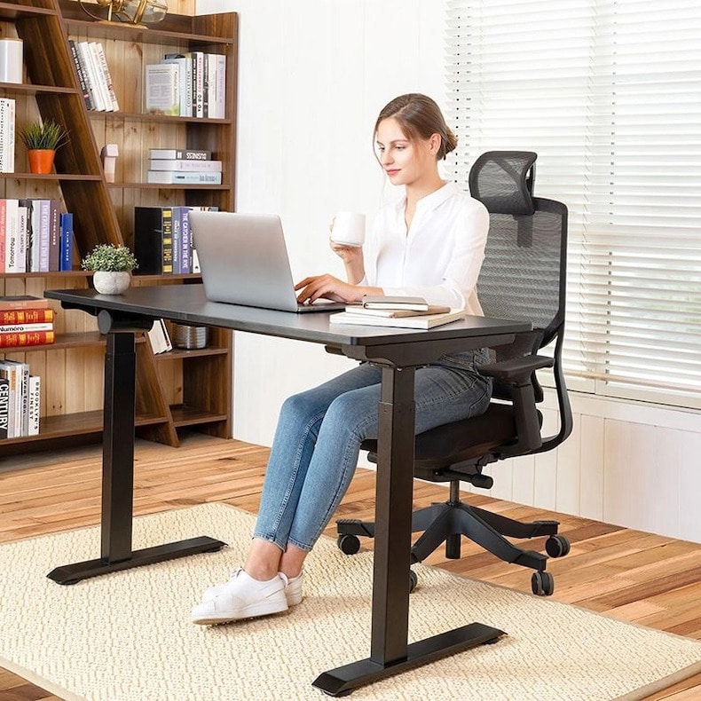 I Started Using an Adjustable Standing Desk at Work 2 Months Ago — and It's  Improved My Posture and Increased My Productivity