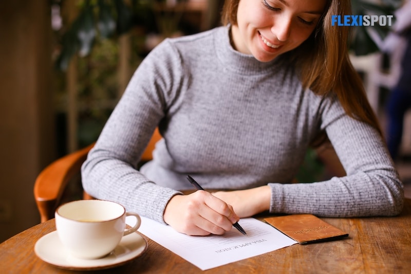 Woman writing a diary