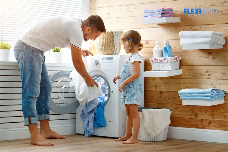 kid and dad washing clothes