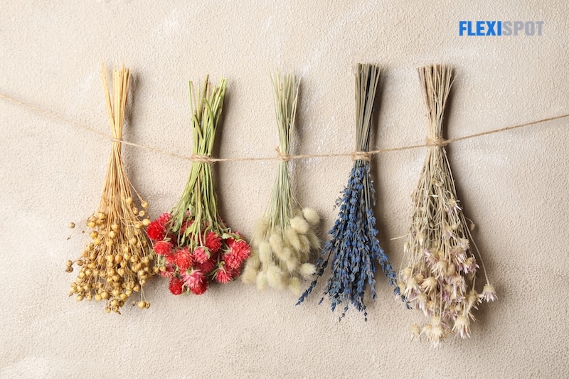 Hang dried flowers as decor and leave them until they wilt.