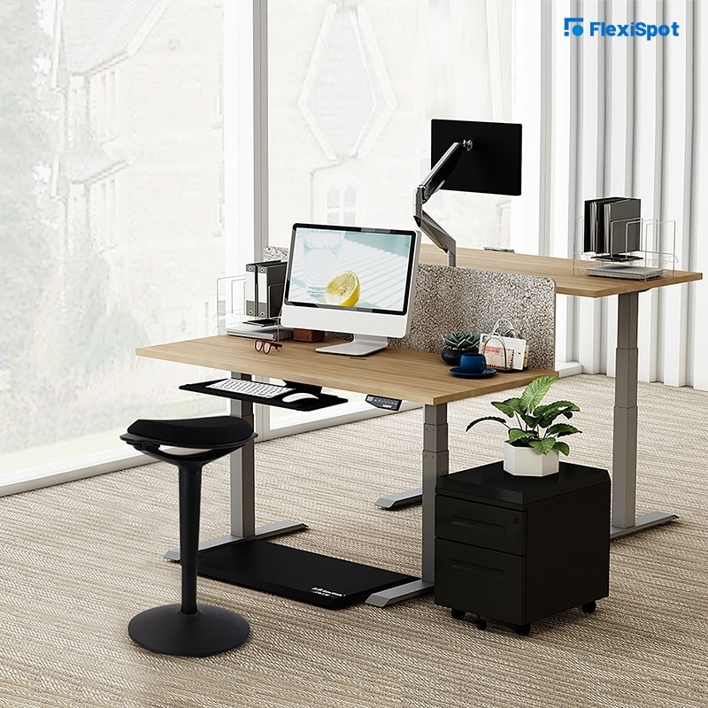 Refurnish your workplace with a standing desk or a wobble chair.