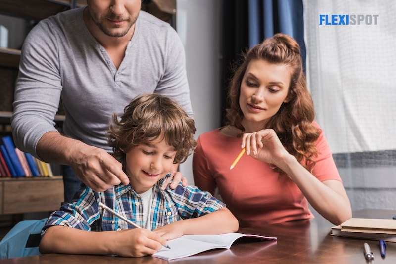 Parents help son with homework