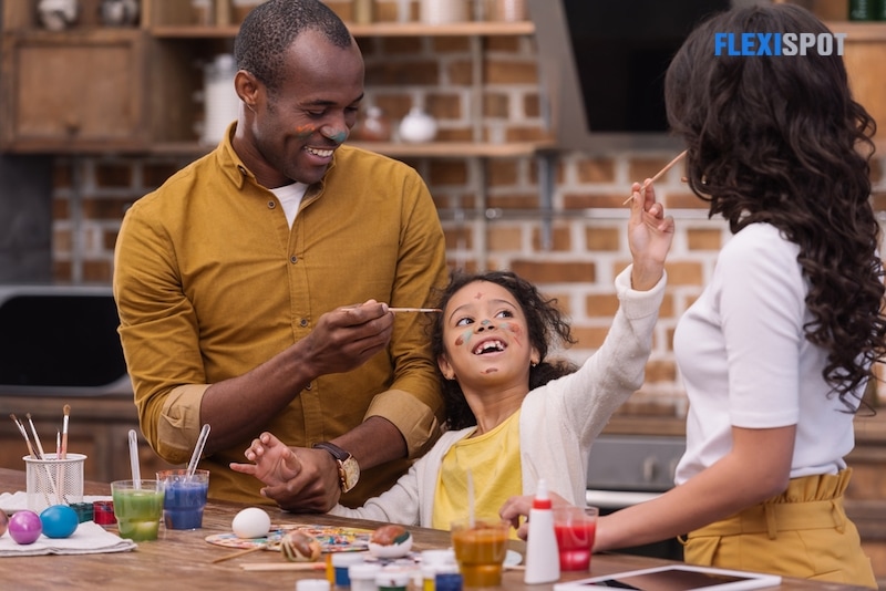 family doing painting activities at home